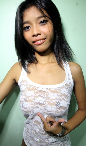 18 year old female Chloe Dash undressing on yoga mat on lawn